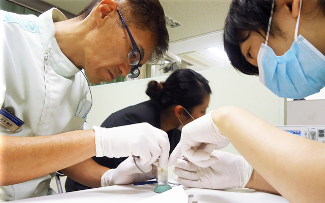 徳島県鳴門市 とみなが歯科医院｜日本歯内療法学会でEMATのポスター発表を行います